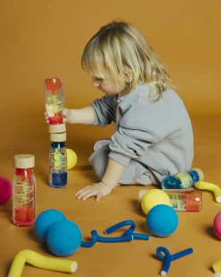 Idealne W Podróży|12M+ | Petit Boum Butelka sensoryczna dwufazowa MOVE SPIRALA różowa