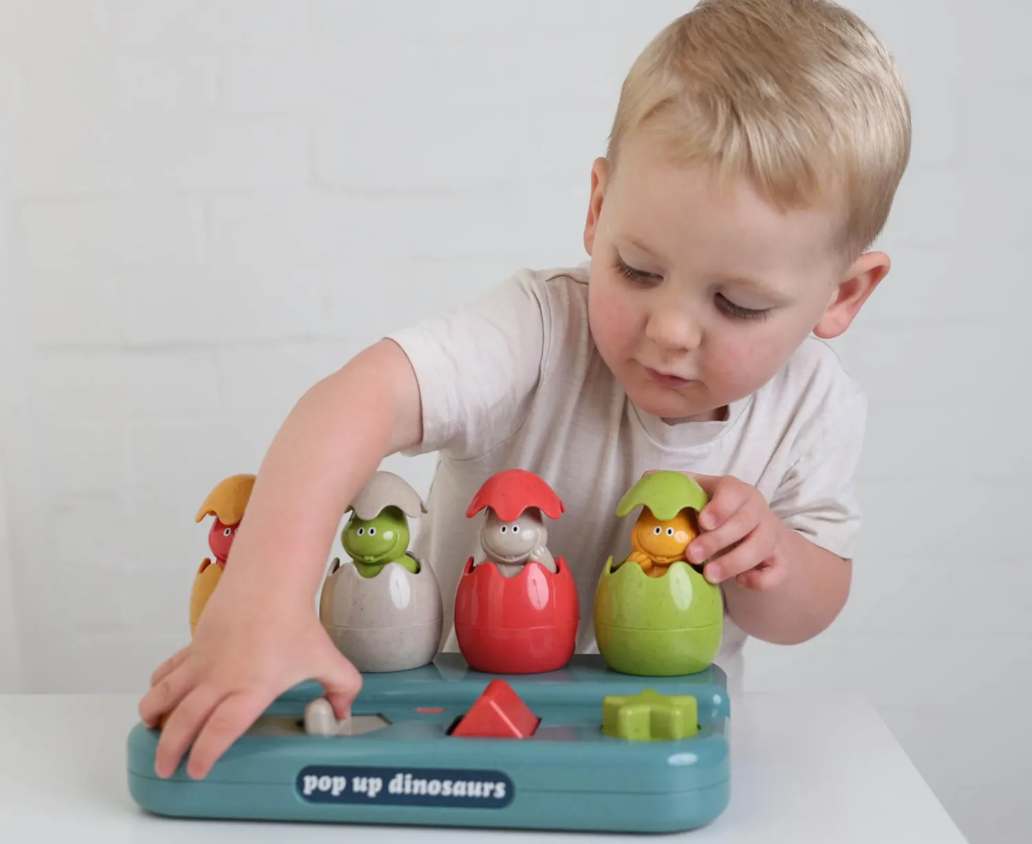 12M+|Aktywizujące | TOLO Bio Konsola Pop Up Dinozaury 12m+
